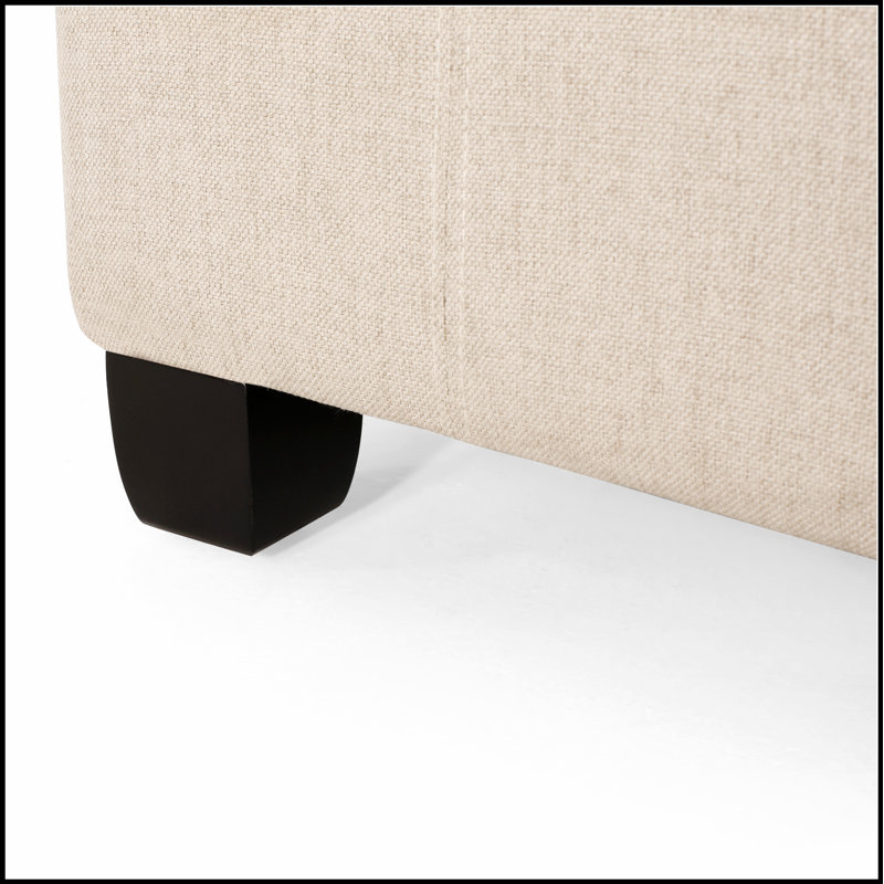 Isabella OTTOMAN avec un revêtement élégant et un rangement spacieux, parfait pour l'organisation et le style de la maison moderne.