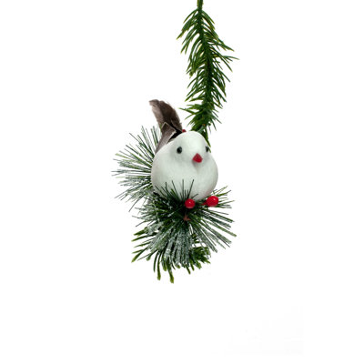 Ornement oiseau blanc sur une branche