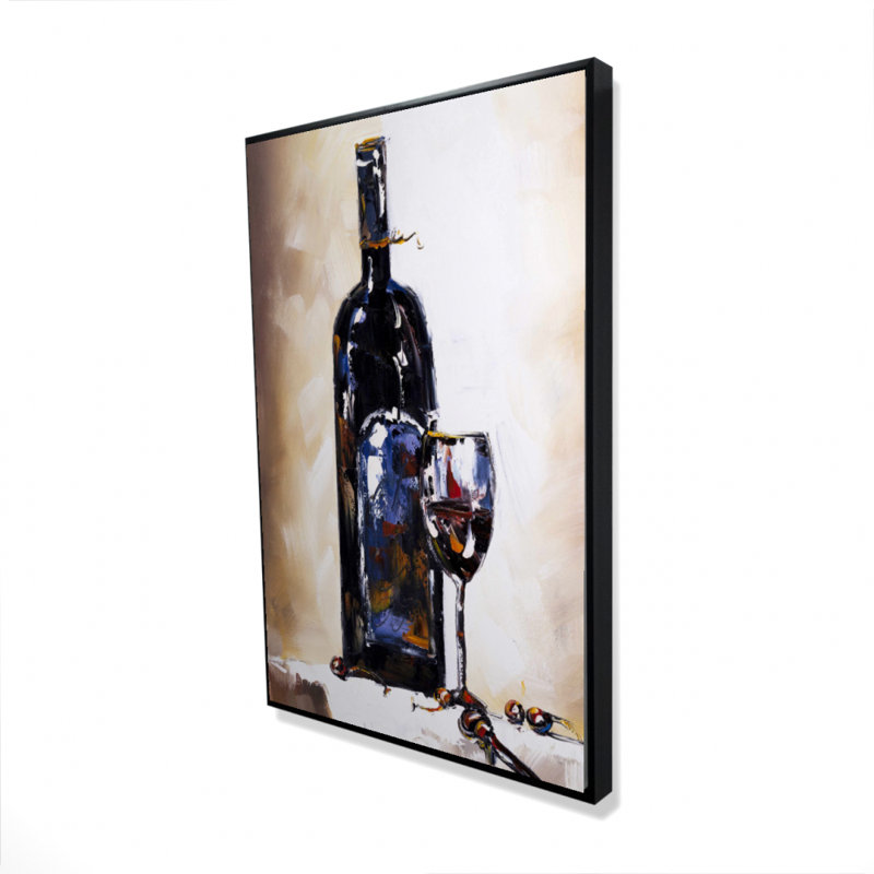 Bouteille et verre de vin rouge