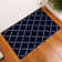 Spiceland Floral Polypropylene Area Rug in Navy