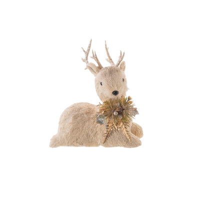 Crème / fourrure de paille dorée couchée sur un cerf scintillant avec jet doré