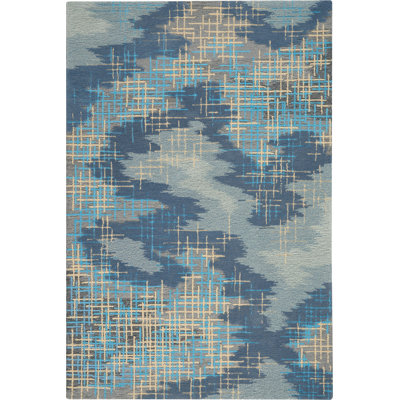 Tapis bleu moderne fait à la main