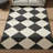 Black Cream Checkered Geometric Woven Base Washable Carpet-51766435
