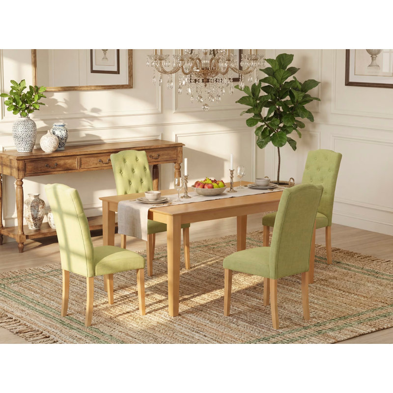 L'ensemble de mobilier de salle à manger 5 pièces comprend une table de salle à manger rectangulaire et 4 chaises rembourrées en tissu Limelight, en chêne