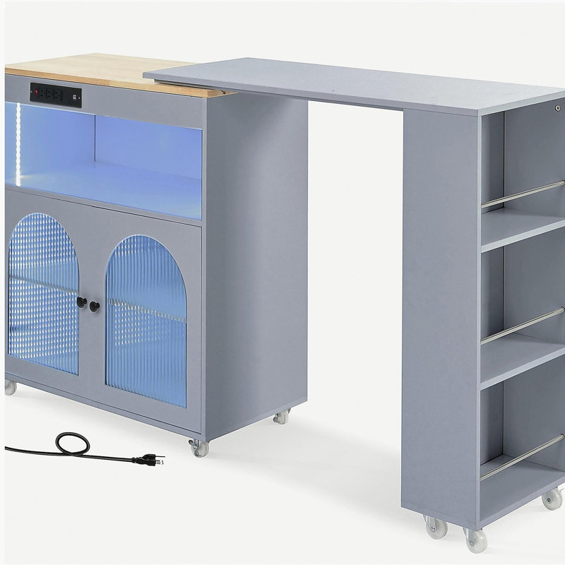 Rolling kitchen island with extension table, equipped with LED lights, power outlets, and 2 rectangular glass doors, storage compartment, and 3 open shelves on the side, gray