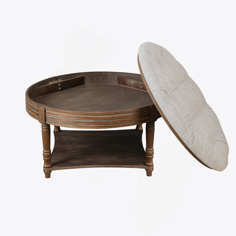 Grande table basse ronde à 2 niveaux avec repose-pieds capitonné, Gris clair