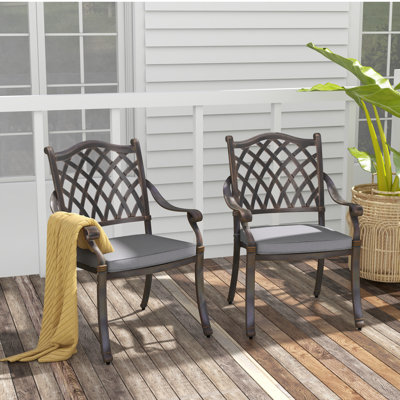 Cherel Metal Outdoor Stackable Dining Armchair with Cushion by Alcott Hill