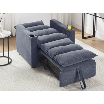 Fauteuil convertible en velours