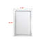 Ce miroir d'appoint Farnborough est en miroir et en faux cristal