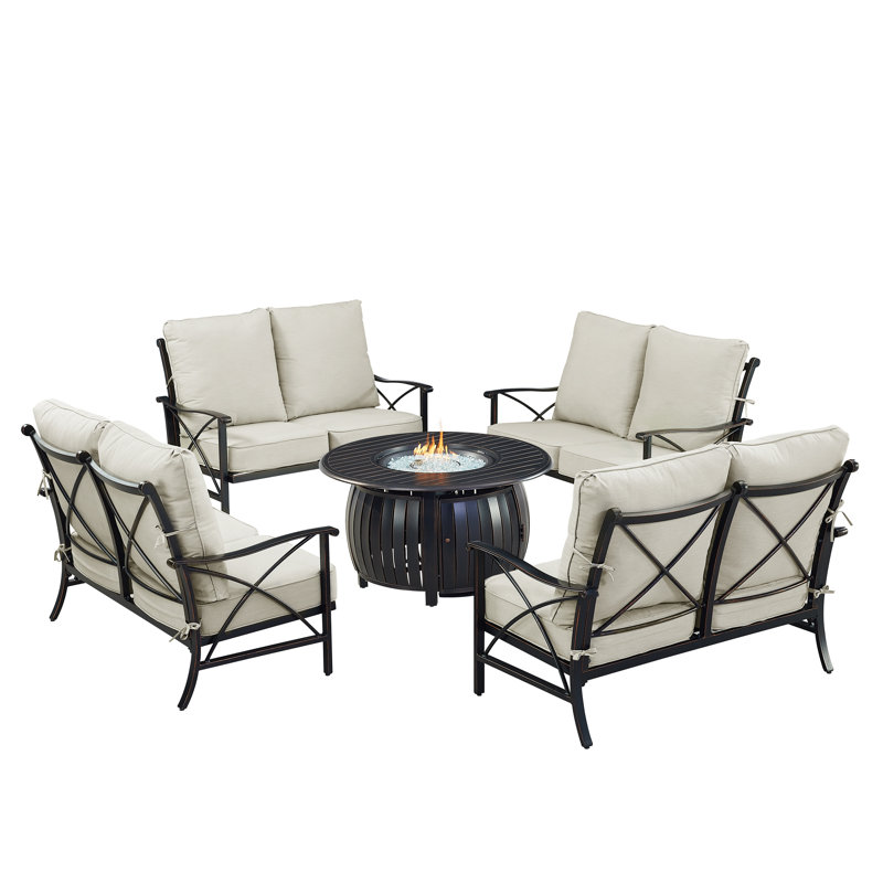 Ensemble de table de foyer en aluminium noir avec quatre causeuses profondes