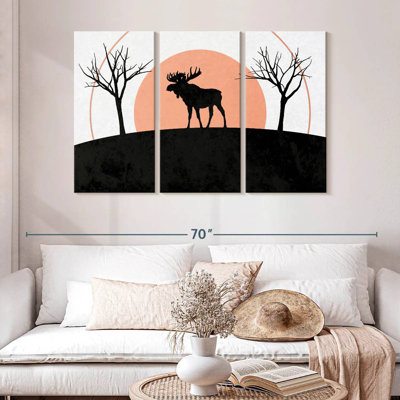 Orignal brumeux et coucher de soleil