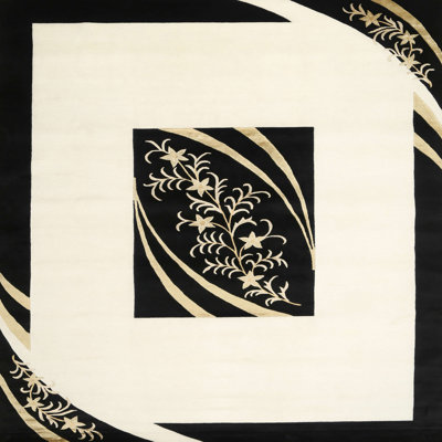 Tapis de zone noir/crème contemporaine
