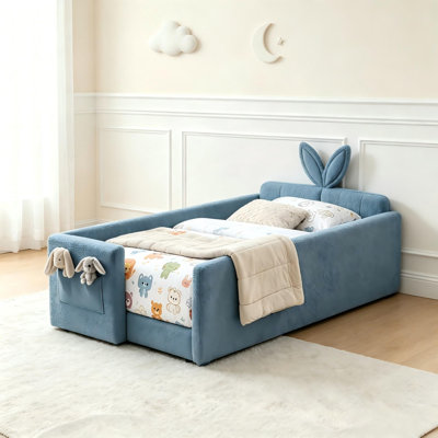 Lit plateforme tapissier simple avec tête de lit en forme d'oreille en forme de lapin, barrière de sécurité et poche de rangement latérale, tissu bouclé, bleu.