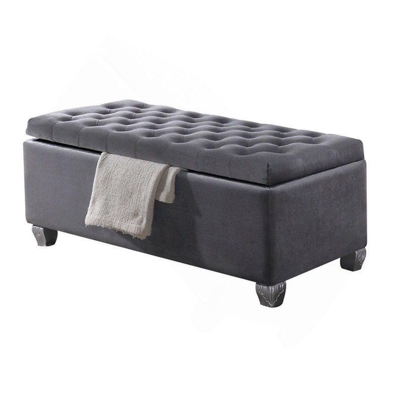 Banc de rangement gris capitonné
