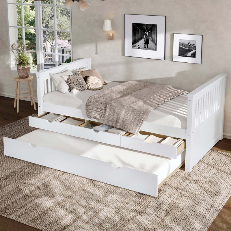 Lit de jour à plateforme simple avec tiroirs de rangement, lit gigogne et bureau d'étude intégré pour économiser de l'espace.