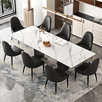 Ensemble de table de salle à manger 9 pièces avec table de salle à manger extensible en pierre frittée de 94,5 po avec 8 chaises à oreilles en similicuir