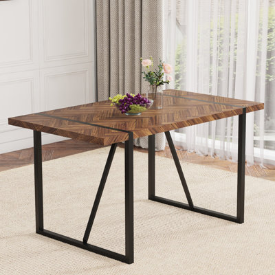 Table minimaliste texturée en bois foncé avec structure en métal stable et praticité charmante avec pieds rectangulaires de style rétro