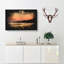 Boat Under An Orange Sunset - Wrapped Canvas-56648534