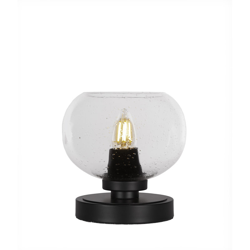 Lampe d'appoint Whitmire montrée dans une finition noir mat avec verre à bulles transparent de 7 po
