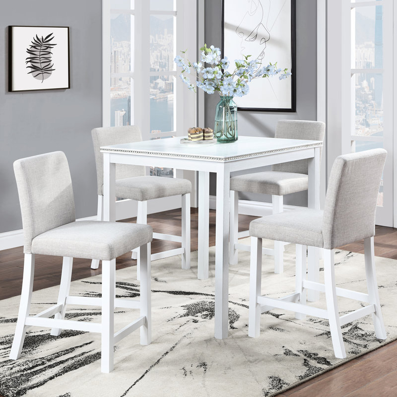 Élégante table de salle à manger à 5 comptoirs en blanc. Table carrée avec décoration en cristal. Bois massif et construction blanche 5 pièces Nuance. Garniture.