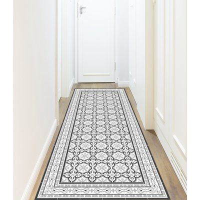 Elske Vinyl Machine Printed Area Rug