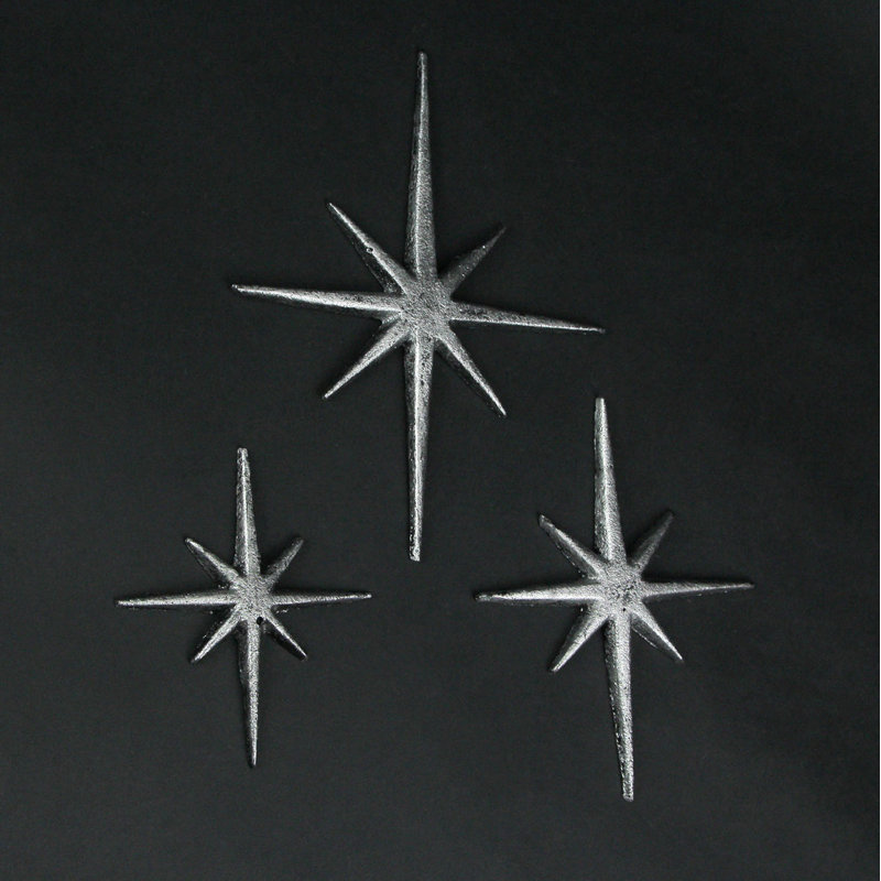 Mid-Century Modern black enamel cast iron 8-pointed starburst wall art set of 3 — 8.5x6.75, 6.75x5.25, 5x4.25 in. H x W, all 0.25 in. D