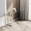 Console avec pieds en acier inoxydable et plateau en verre - Design moderne pour espace de vie et transparence