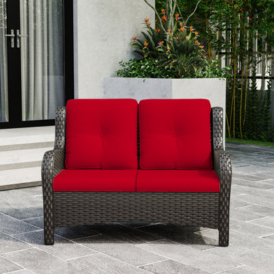 Meikel 49" Wide Outdoor Wicker Reversible Loveseat with Cushions by Winston Porter
