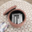 Repose-pieds rond avec rangement en velours Briana-617450945