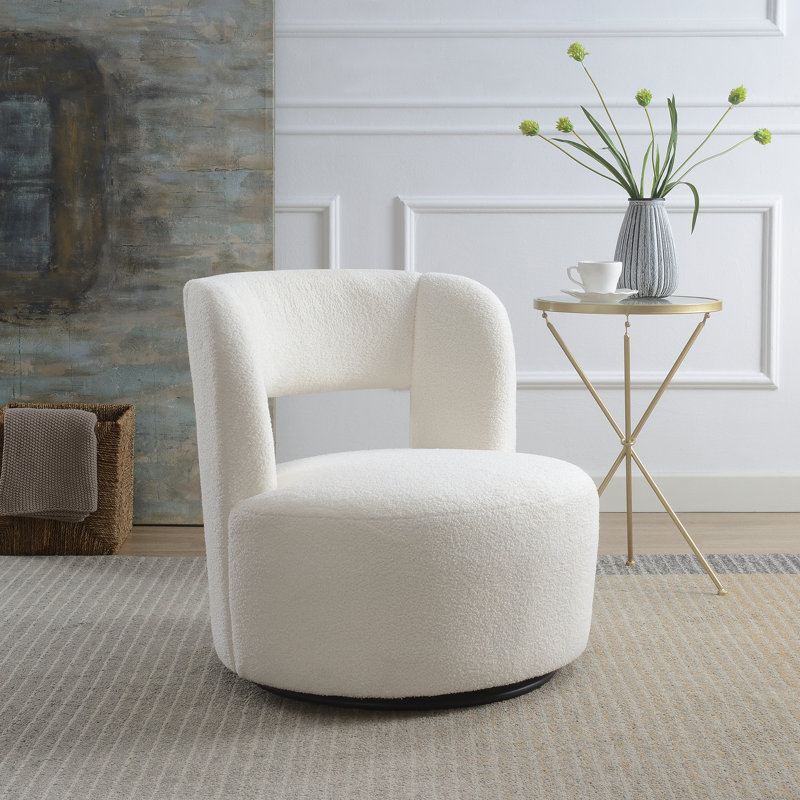 Fauteuil demi-tonneau pivotant en tissu Teddy