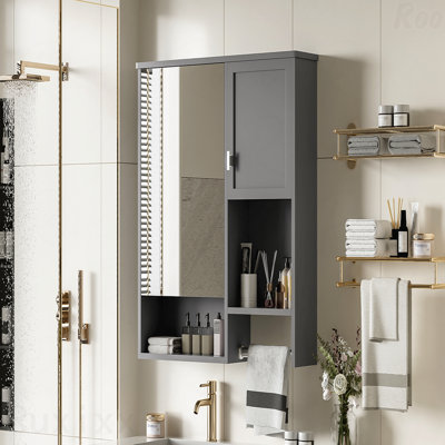 Armoire à pharmacie murale moderne avec miroir et barre à serviettes, rangement compact pour les petites salles de bain et une organisation efficace.