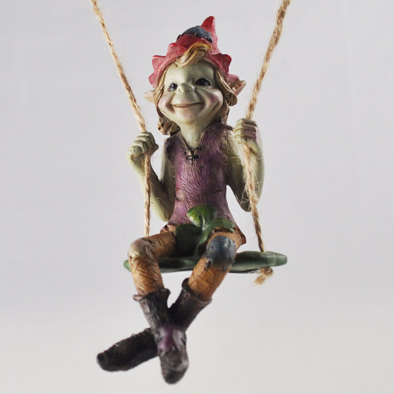 Eudora Pixie Hanging On A Clover Swing