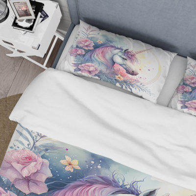 Ensemble de housse de couette mignonne en forme de licorne entourée de fleurs III en microfibre / polyester