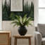 Grand vase rond noir avec aspect poterie