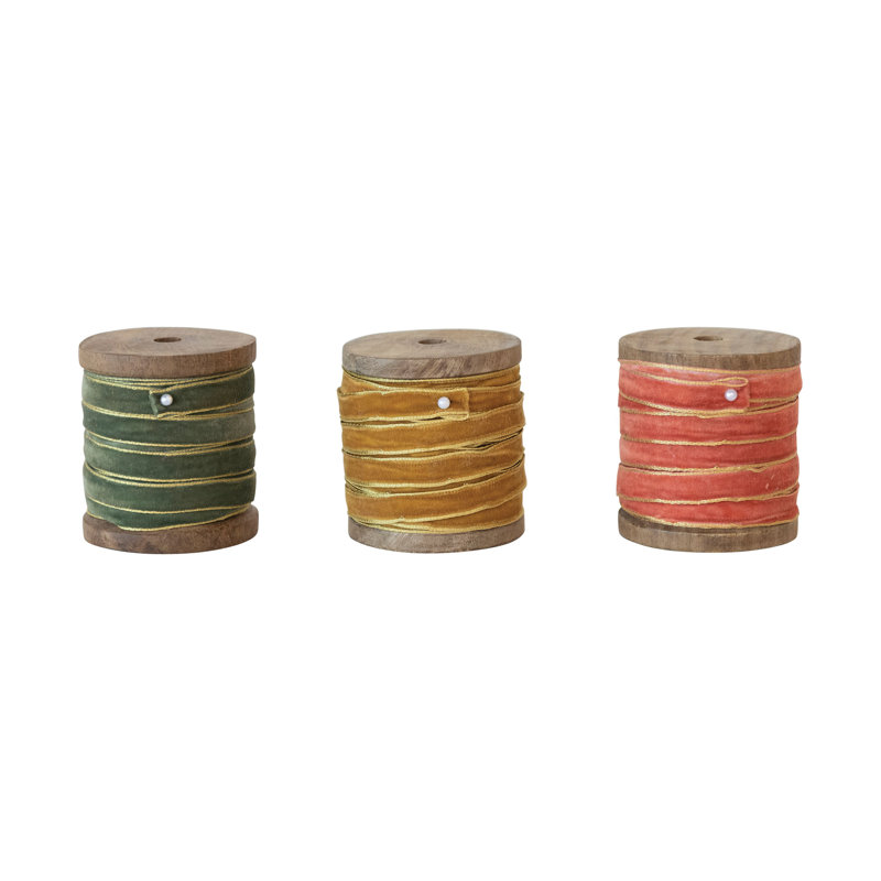 Ruban de velours avec bords métalliques sur bobine de bois