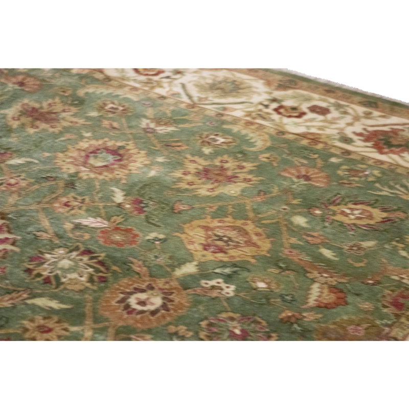 Hand Knotted Wool Oriental Area Rug in Green And Ivory
