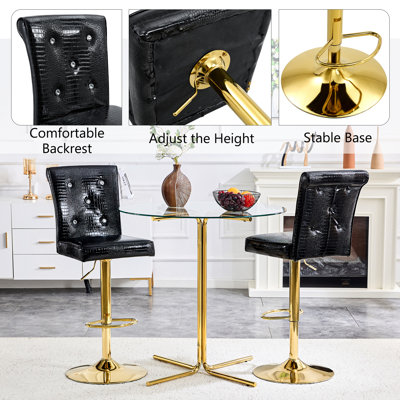 Un ensemble de 2 fauteuils-bar relevables en cuir de crocodile noir rétro, avec fermoir en cristal et cuir synthétique, ajoutant une touche d'élégance et de mystère à la salle à manger