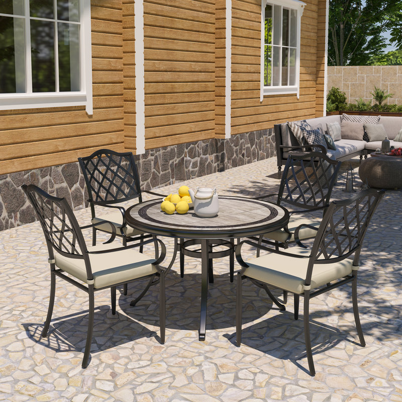 4 - Person Patio Dining Set with Round Table , Cushions Included