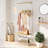 This Metal And Solid Wood Combination Coat Rack Features A Built-In Shoe Bench And Cabinet, Three Storage Shelves, Five Removable Hooks, And A Simple, Pure White Design.