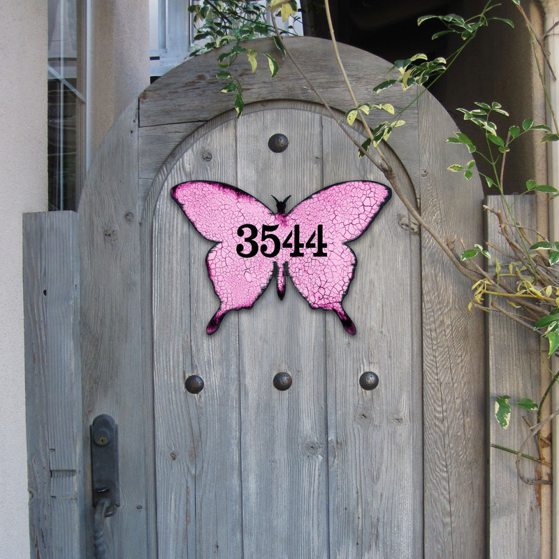 Fixation murale papillon