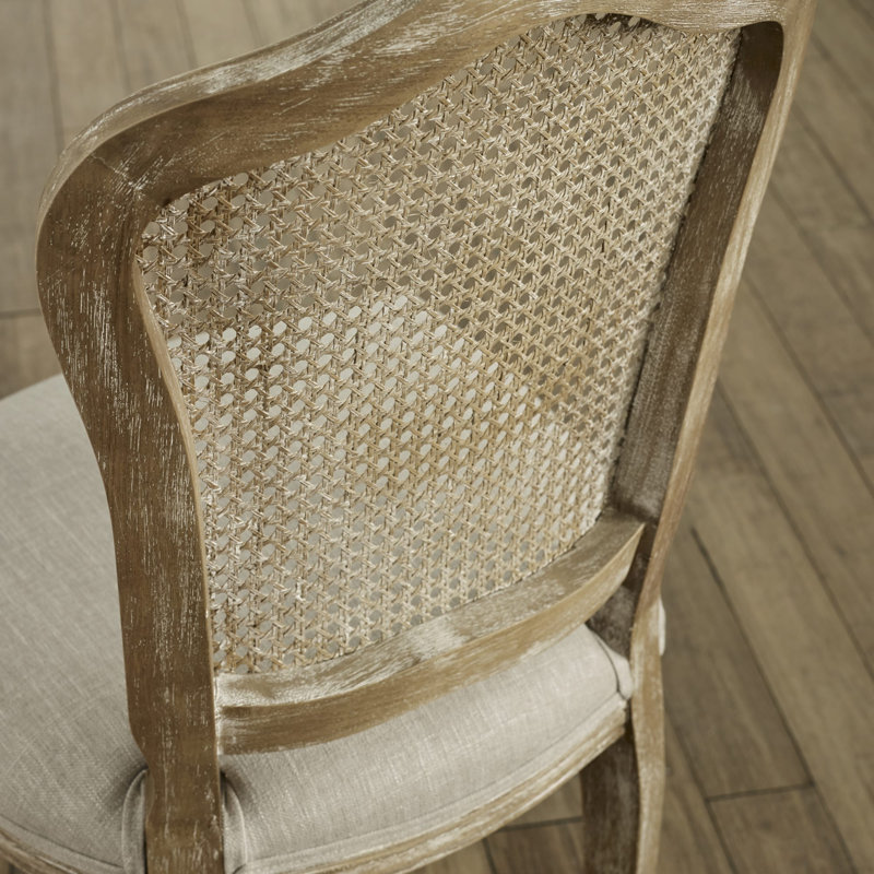 Tamkia 49 cm H Upholstered Linen Full Back Dining Chair in Brown