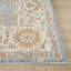 Tapis d'intérieur Vladilen bleu/ivoire à bordure transitionnelle performante-1291889689