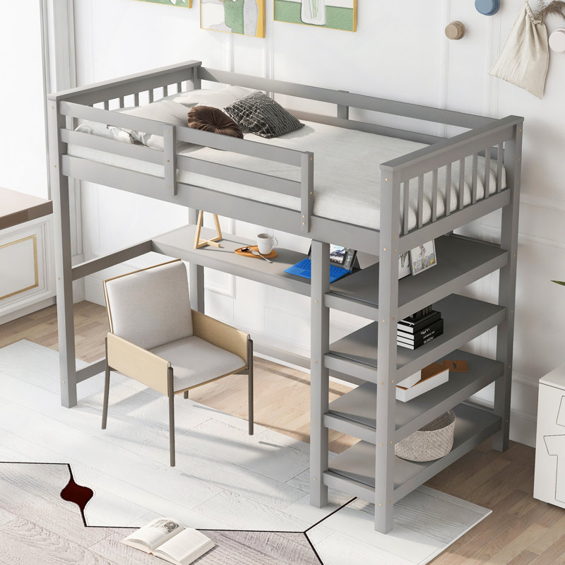 Lit mezzanine avec tablettes de rangement et bureau sous le lit