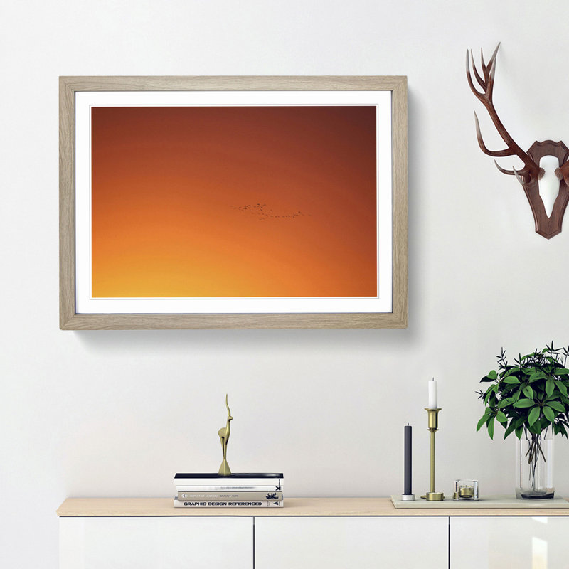 Birds in Flight During an Orange Sunrise - Picture Frame Photograph Print, 27cm H x 36cm W x 2cm D, Oak Framed