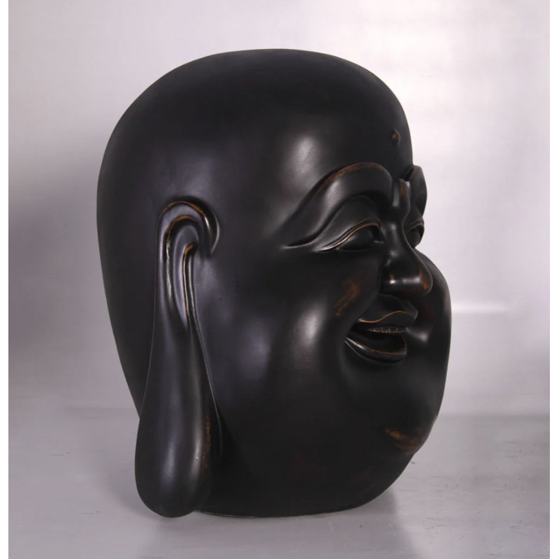 Statue de tête de bouddha joyeux