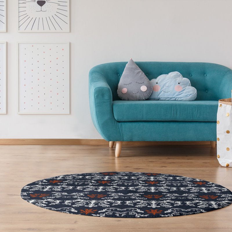 Tapis rond bleu damassé à motif baroque