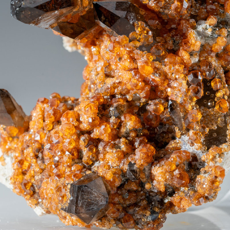 Spessartine Garnet on Smoky Quartz from Fujian Province, China