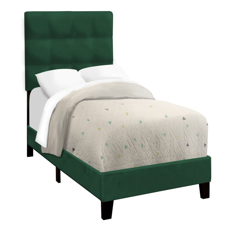 Élégant lit rembourré en velours avec tête de lit capitonnée et fabrication robuste, idéal pour une chambre à coucher élégante et confortable.