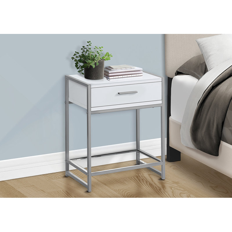 Table de chevet polyvalente en bois avec rangement et tablette décorative, parfaite pour l'organisation et le style de la chambre à coucher.