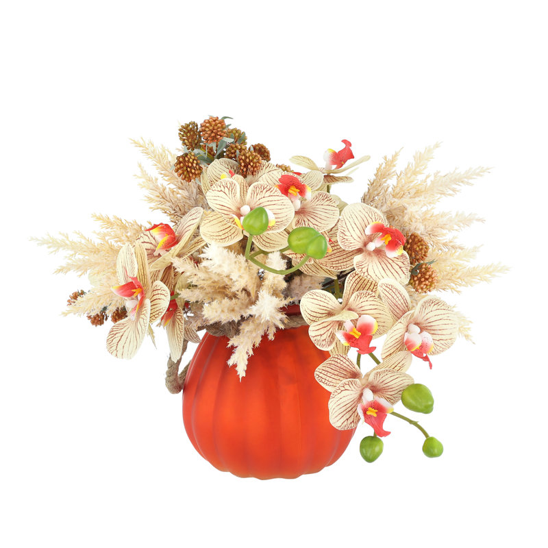 Arrangement d'automne Lohman orchidée et pampa dans un vase en verre